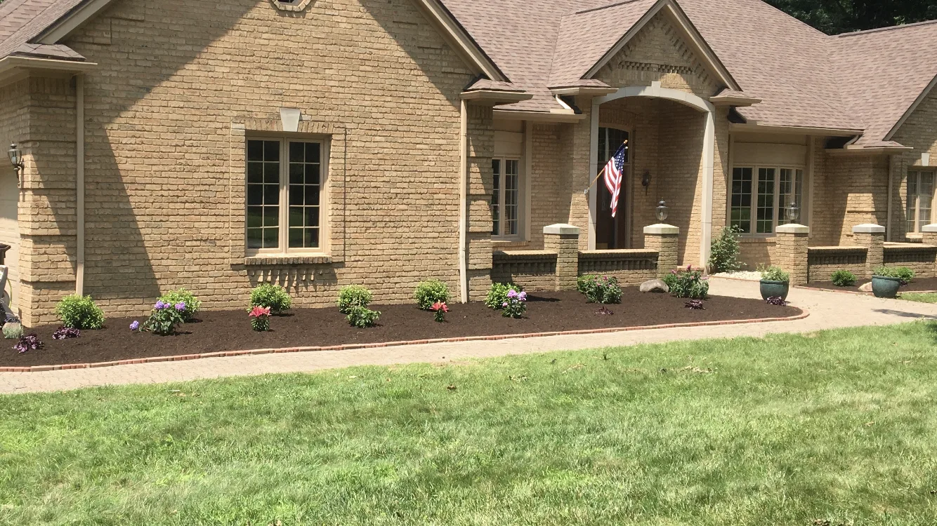 Finished landscape design and installation with clean planting beds by Kerekes Landscape in Sylvania and Toledo